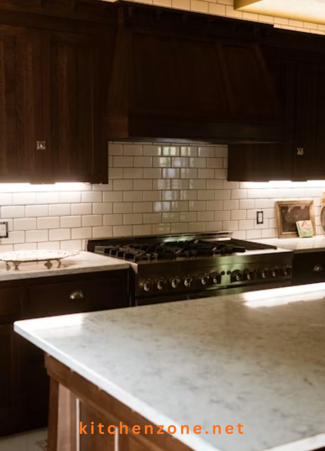 Custom stone range hood serving as a focal point above a modern kitchen stove