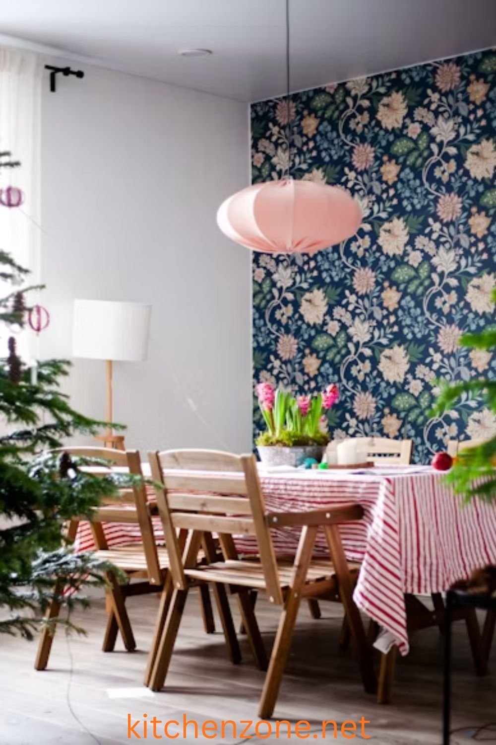 Aesthetic dining room decorated with a tall potted plant in a stylish vessel