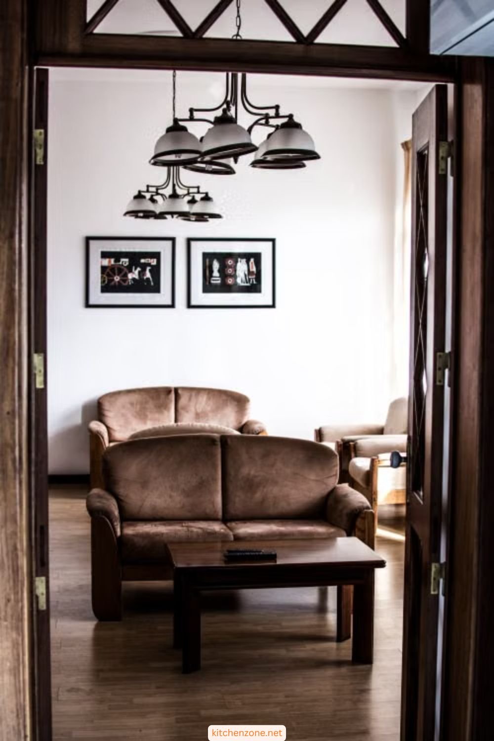 Living room with dark wood tones like walnut and mahogany furniture